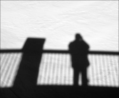 Self-portrait in snow and shadows
