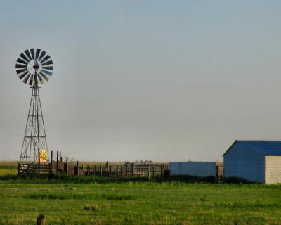 Windmill and Barn at Sunset Near Claude