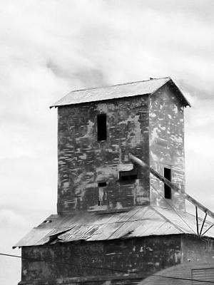 An old abandoned grain elevator along old Route 66. The railroad tracks are long gone.