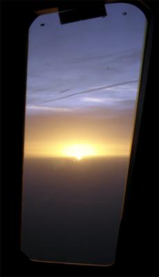 Sunset through a cockpit window