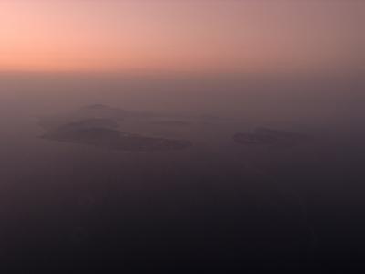 Santorini emerging from the dark