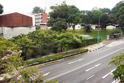 As viewed from the overhead bridge, road going towards the city.