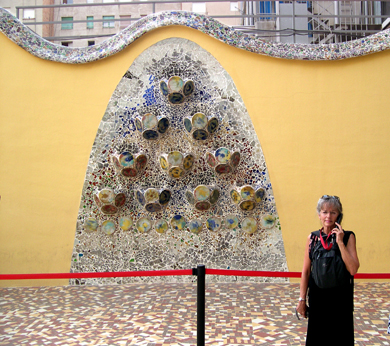 Gaud's Casa Batli: Judy listening to the recorded tour near the back wall of the rear courtyard.