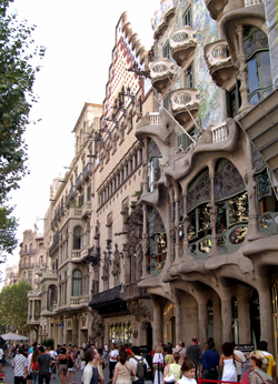 Antoni Gaud's Casa Batli (right) - (1906) - on the Block of Discord. Balconies seem shell -like or perhaps mask-like.