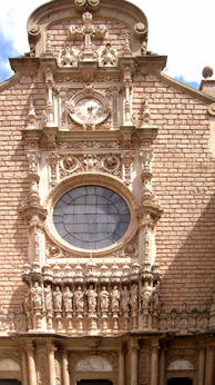 Facade of basilica - Christ and the 12 apostles. Basilica primarily is a shrine to La Moreneta (The Black Virgin).