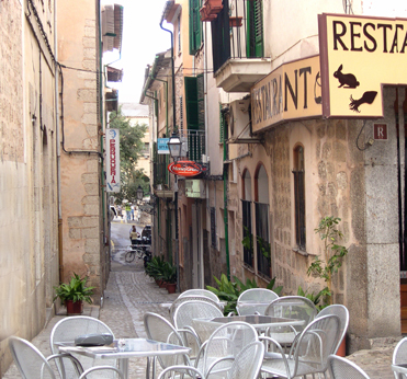 A street in Sóller. Sóller sits in a basin, Valle de los Naranjos (Valley of the Oranges) on Mallorca.