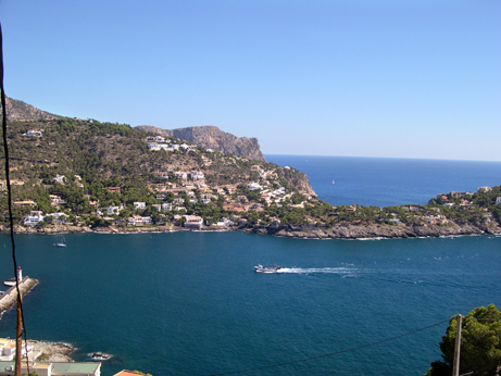 Port dAndratx on the west coast of Mallorca: View is toward the southeast of the port, with Cap de sa Mola on the right