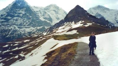 Judy on the trail from Mannlichen to Kleine Scheidegg. The Alps are in the background.