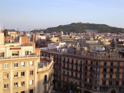 View of Barcelona from the cafeteria of El Corte Ingls department store. Montjuc is in the background.