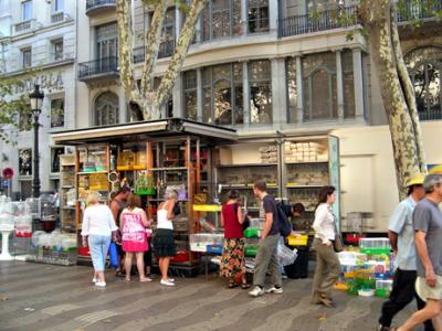Judy checking out a bird stand on Las Ramblas. Lots of small pets sold for apartment living, typical of Barcelona.