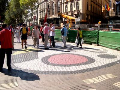 Ceramic paving by Joan Mir. English writer Somerset Maugham called Las Ramblas, The most beautiful street in the world.