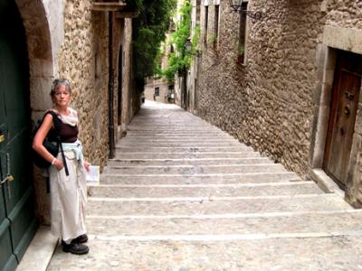 Judy heading up towards the cathedral from a  street in el Call, the Jewish Quarter