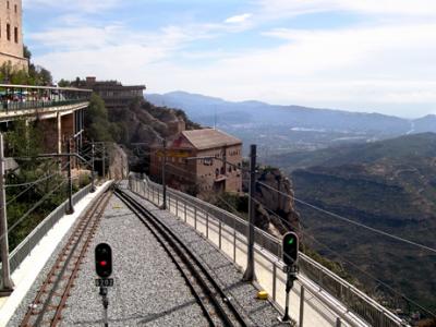The tracks of the rack (cog) railway train. Photo taken from near the monastery (Monestir de Montserrat).