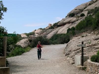 Judy returning from the hermitage of Sant Joan (seen in the background), after taking the funicular.