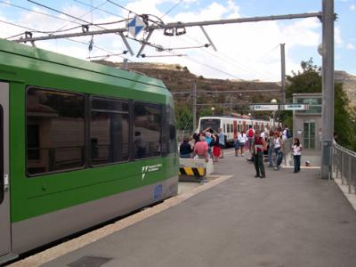 3rd of 3 trains: Judy at Monistrol de Montserrat station - from Catalan train (white) to rack (cog) railway train (green).