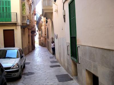 Judy in front of our hotel, the Palacio Ca Sa Galesa, on Carrer de Miramar in the Old Quarter of Palma