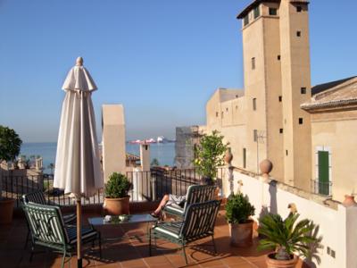 A view from the terrace at our hotel, the Palacio Ca Sa Galesa. Judy is in the chair. The Mediterranean Sea is in the background