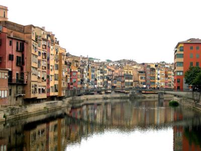 Houses along the Onyar River - emblem of Girona. View from Pont de Sant Feliu over the Onyar River.