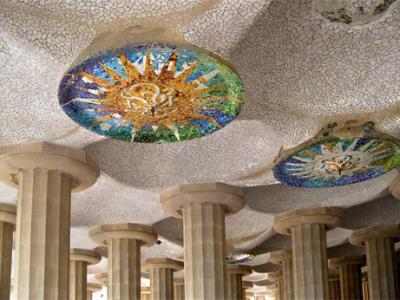 Mosaic suns on the ceiling of the Sala Hipstila (Hypostyle Forum) in Parc Gell.
