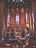 Interior of the Catedral de Barcelona - from the nave facing the high altar - grandiose & austere like most Gothic churches.