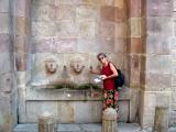 Judy at a Gothic, public well/fountain on Plaa de Sant Just. The well/fountain is the oldest water source in Barcelona.