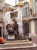 Close-up of Dals monument to the Catalan philosopher Francesc Pujols, in front of the Dal Theater/Museum