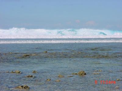 A typhoon went near.  Shut down diving but I was GLAD for the barrier lagoon.  Those are 15-20 foot breakers!