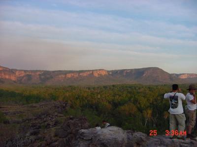 Kakadu on fire in the distance. Fire is a natural occurrence here and is necessary for the ecosystem.