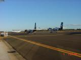 Planes for the flight out.  Ours (left) had a flat tire....