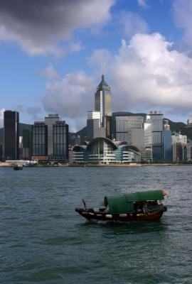 Small boat passing Victoria Harbour.jpg
