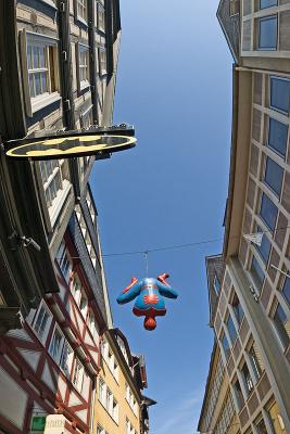 Spiderman in front of a comic book store