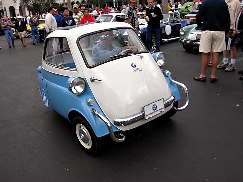 Isetta by BMW - 4 wheels actually. The 2 in the rear are only about 2 apart. Some British built Isettas were 3 wheeled.