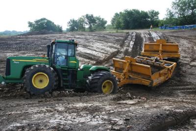 Smoothing out the boat ramp in the cove (8/14/05)
