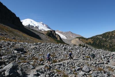 The trail meanders through talus fields