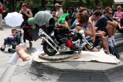 Toy Motorcycle at the Fountain
