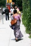 Strolling on LaGuardia Place Sidewalk