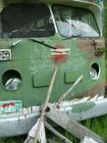 Green Bus Bullet Hole