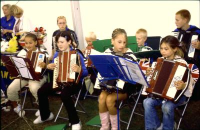 Accordian Group Playing in the Festive Tent