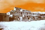 orange sky Taos Pueblo