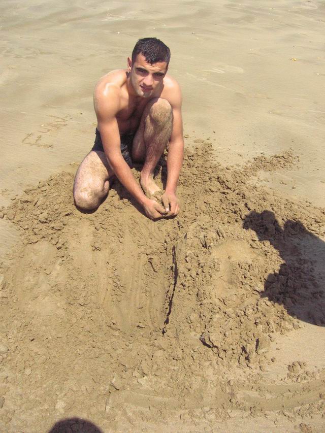 Man with his sand pit.