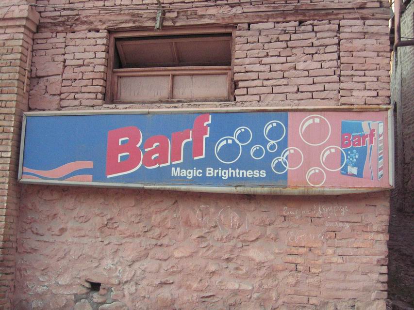 Billboard in Sheki. BARF is a type of laundry detergent.