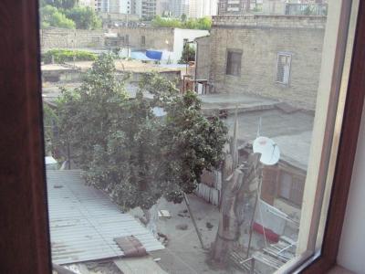 Looking to the right out my hotel window in Baku, directly into some yards.