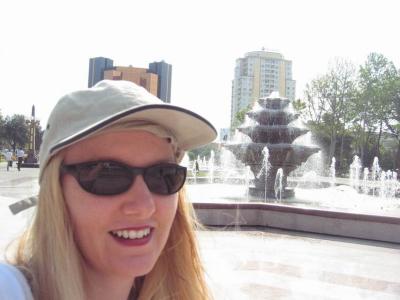 Anita in Heydar Aliyev square.  Looking tour-tastic in the hat!