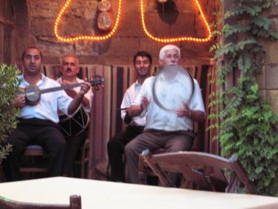 Music at Caravan Saray.  Dig the guy in the back on the right!  He would crane out and grin each time we took photos!