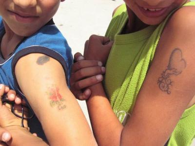 Nifty tattoos on the cool children.