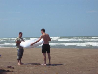 Vusal and Mark enjoy the wind with the towel.