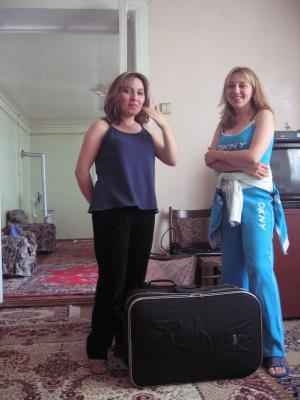 Ayten and Natavan pose with a stuffed suitcase.  Natavan is moving to Kiev.
