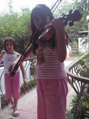Musical interlude during tea.  She's 12 years old.