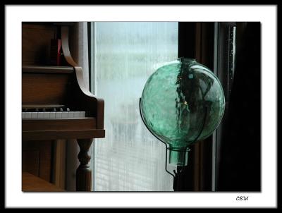 Piano  with green glass