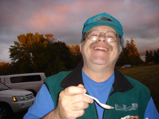 Howie Meltzer enjoys some cake 218.jpg